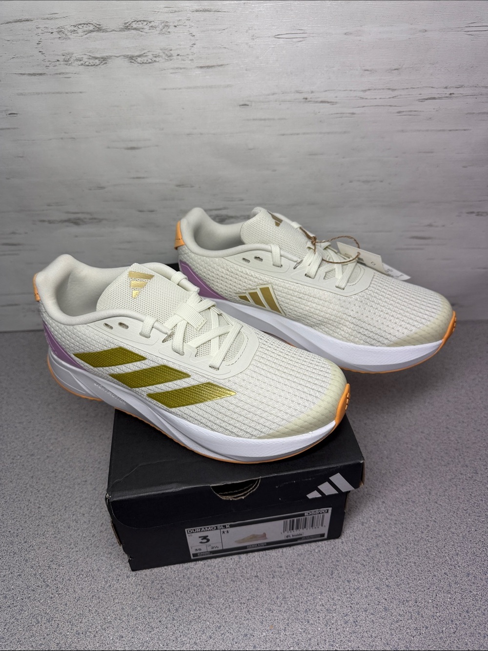 adidas Women’s White Running Shoes with Gold and Purple Accents